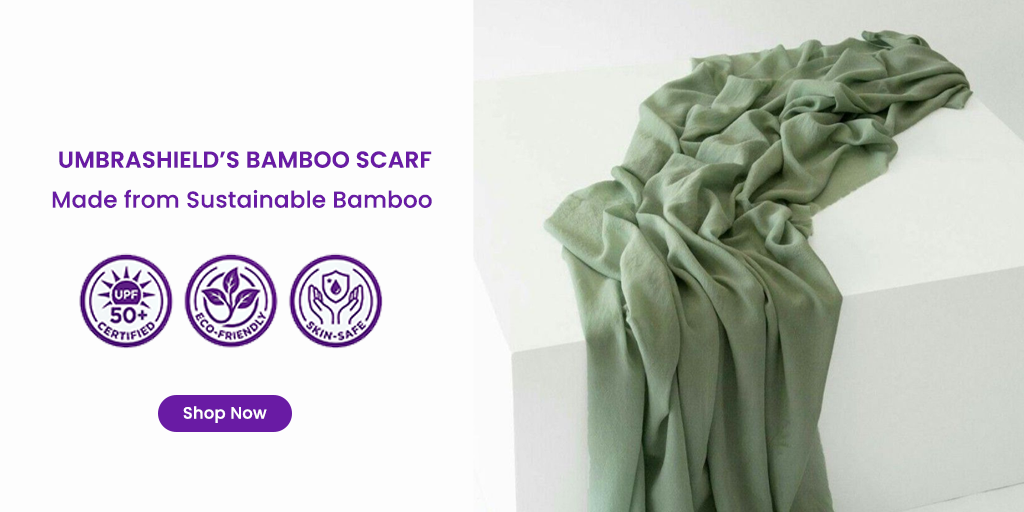 Umbrashield UPF 50+ eco-friendly bamboo scarf for women — sustainable sun protection product flat lay on neutral surface